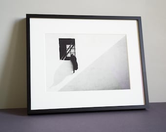 Minimalist black and white photography – cat jumping out of a window | Original fine art print | Wall art | Signed – "Cat" (2020)