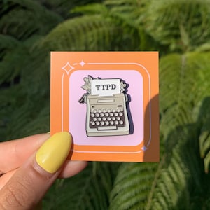 TTPD pin typewriter eras tour swiftie badge metal black retro keepsake