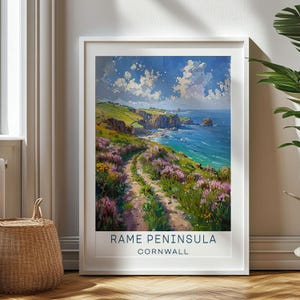 May include: A vintage travel poster featuring a scenic coastal path with wildflowers leading to a rocky coastline and blue ocean. The poster reads "Rame Peninsula, Cornwall".