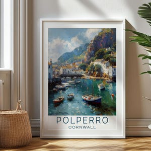 May include: A vintage travel poster featuring a colourful painting of a harbour town with boats and a mountain in the background. The text "Polperro Cornwall" is at the bottom of the poster.