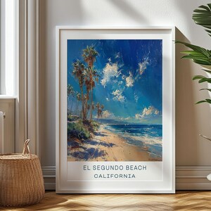 May include: A framed painting of a beach scene with palm trees, blue sky, and white clouds. The text "EL SEGUNDO BEACH CALIFORNIA" is at the bottom of the painting.