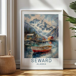May include: A vintage-style travel poster featuring a scenic view of Seward, Alaska. The poster depicts a small boat on a calm lake with snow-capped mountains in the background. The text "SEWARD ALASKA" is printed at the bottom of the poster.