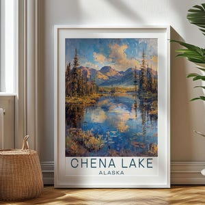 May include: A vintage travel poster featuring a scenic view of Chena Lake in Alaska. The poster depicts a tranquil lake surrounded by lush greenery and towering mountains, with a vibrant blue sky and fluffy clouds overhead. The text "Chena Lake, Alaska" is prominently displayed at the bottom of the poster.