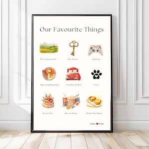 May include: A framed print titled "Our Favourite Things" featuring watercolor illustrations. The images include a countryside scene, a key, a game controller, breakfast, a bed, a paw print, a fruit tart, movie snacks, and pastries.