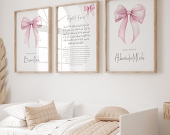 May include: Three framed wall art prints. Each print has a light wood frame. Two prints feature a watercolor pink bow. The third print has Arabic text. One print says "Always start with Bismillah". The other says "Always end with Alhamdulillah".