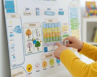 May include: A white magnetic wall calendar titled Mon Calendrier with French text. It features sections for days, dates, months, seasons, weather, and emotions, with colorful magnetic tiles for tracking time, weather conditions, and daily moods.