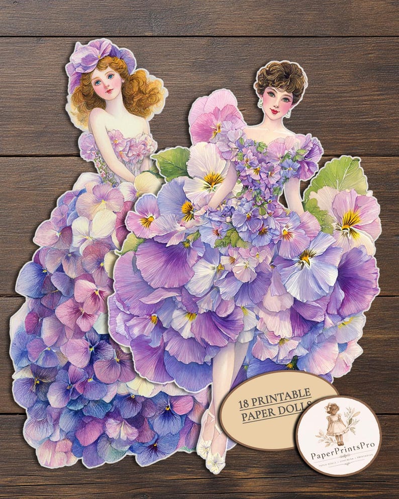 May include: Two paper dolls featuring figures wearing elaborate gowns constructed from layers of purple, violet, and blue pansy petals. A circular label displays the text 18 PRINTABLE PAPER DOLLS and the logo for PaperPrintsPro.
