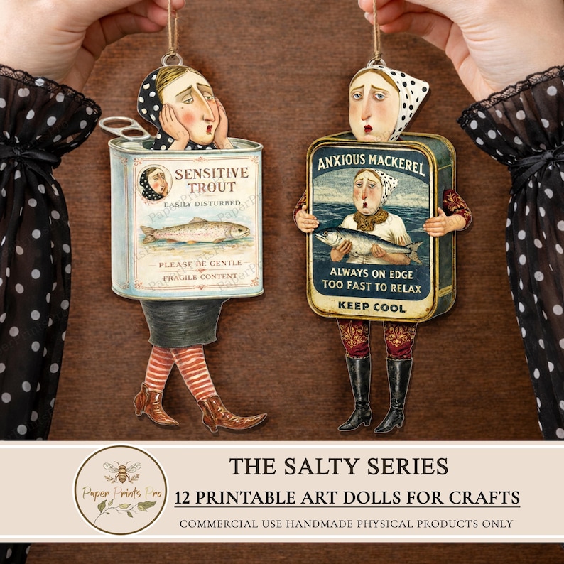 Printable paper dolls set by PaperPrintsPro featuring 12 vintage fish character dolls inspired by retro sardine tins. Includes expressive illustrated paper dolls, vintage advertising ephemera labels, and decorative background papers. Designed for printing and cutting, ideal for junk journals, scrapbooking, handmade paper crafts, and mixed media projects. Digital download only.