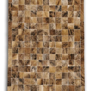 May include: Rectangular area rug with a patchwork design. The rug features a repeating pattern of squares in shades of brown, tan, and black. The squares have a textured appearance, and the rug has a border of the same material.