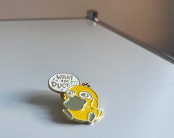 Enamel Pin Psyduck Figure with “What the Duck” | Funny Cartoon Badge | Quirky Gift for Gamers & Collectors