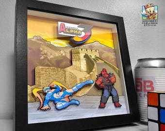Street Fighter Alpha 3 R Mika vs Akuma Pixel Art Shadow Box | Great Wall-scenen | Välj valfri karaktär