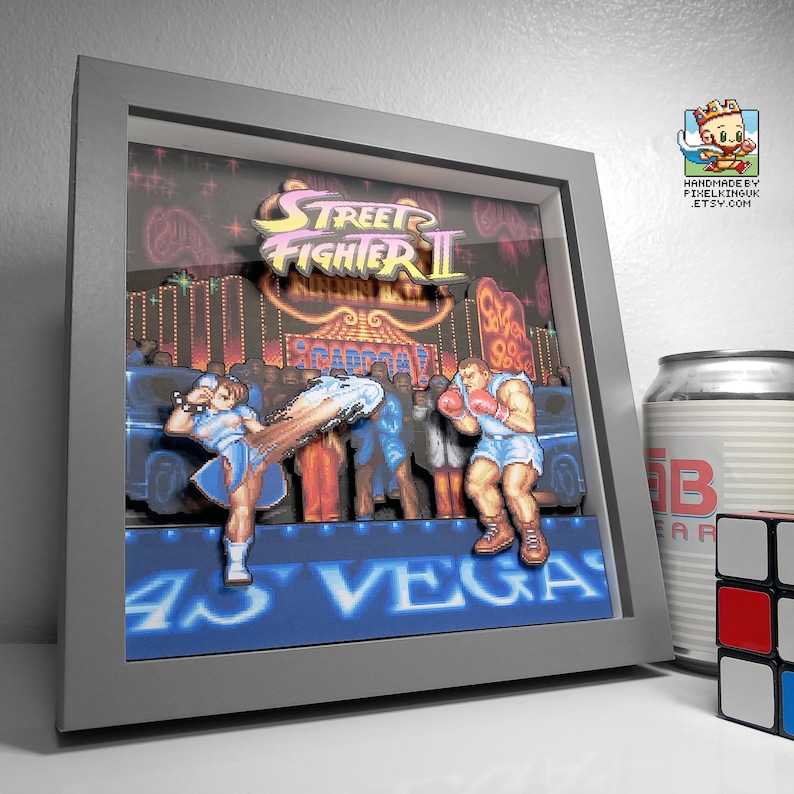 Alternate angled view of the framed Street Fighter II Chun-Li versus Balrog scene.