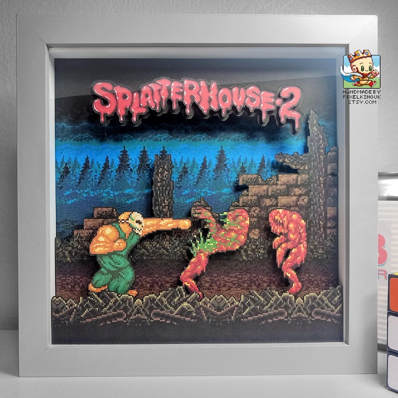 Front view of the framed Splatterhouse 2 Boreworm battle shadow box.