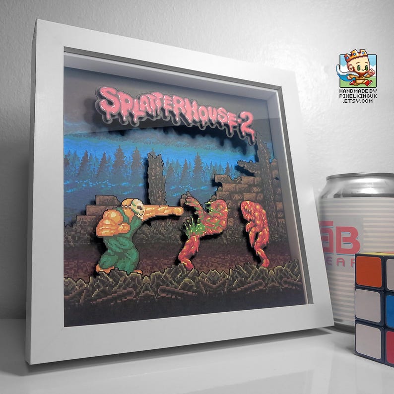 Angled view of the framed Splatterhouse 2 battle scene showing the depth between the layered artwork.