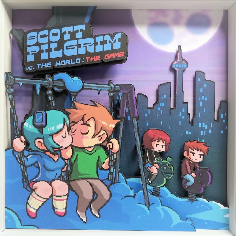 May include: A 3D diorama of the video game "Scott Pilgrim vs. The World: The Game". The diorama features Scott Pilgrim and Ramona Flowers kissing on a swing set, with other characters from the game in the background. The diorama is set against a cityscape with a full moon in the sky.