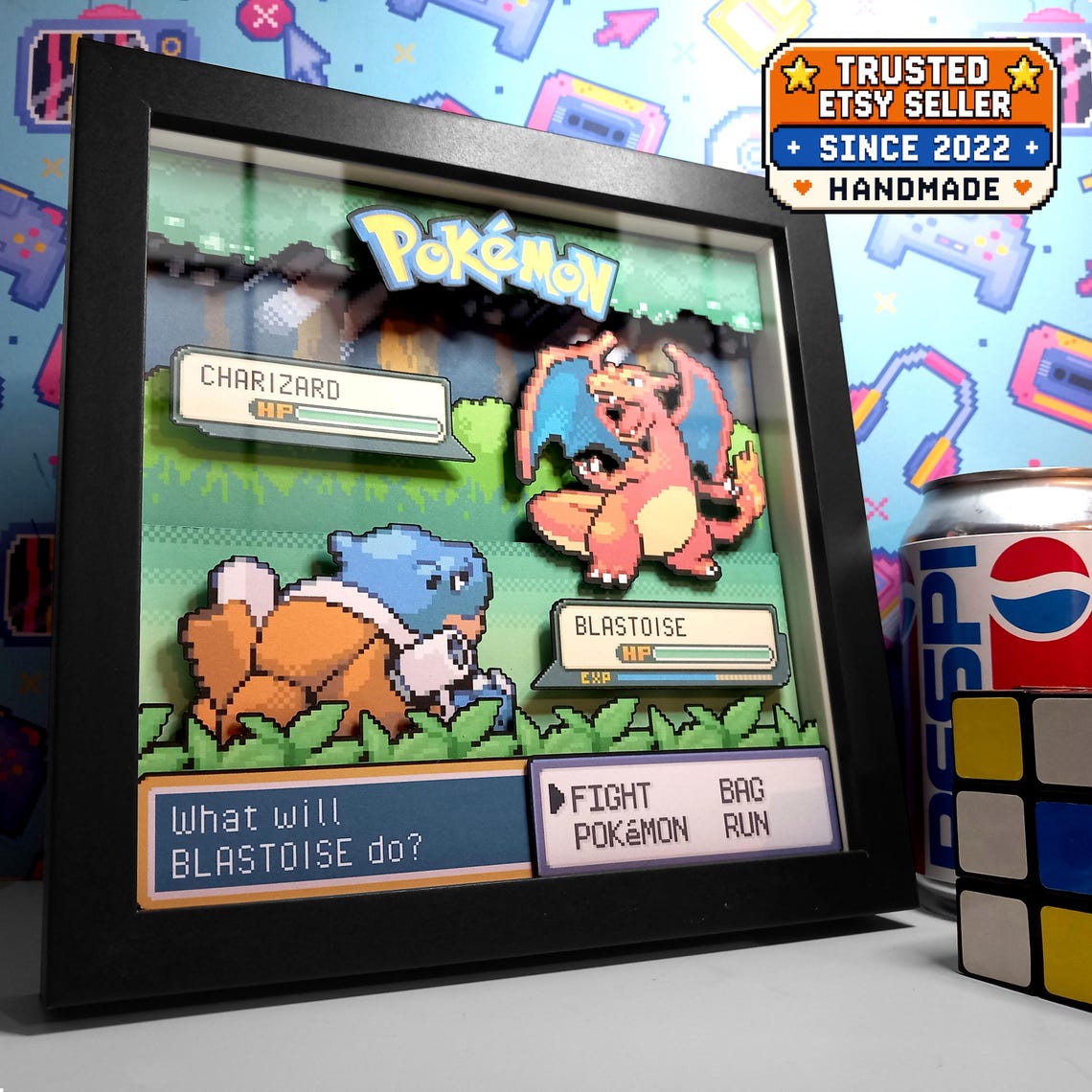 Custom Pokémon battle shadow box showing Charizard and Blastoise in a layered forest scene