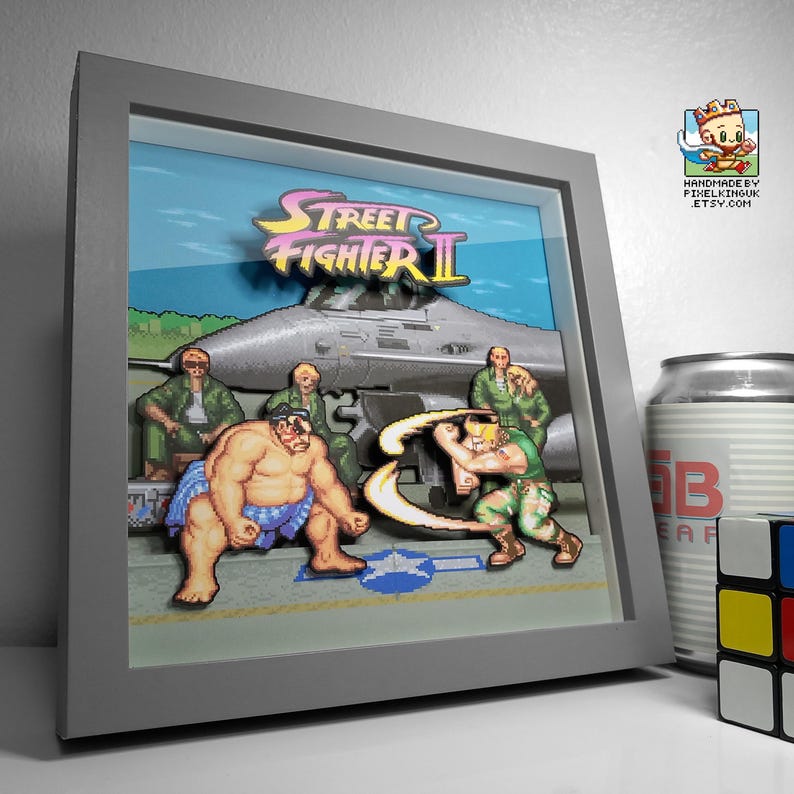 Alternate angled view of the framed Street Fighter II E. Honda versus Guile scene.