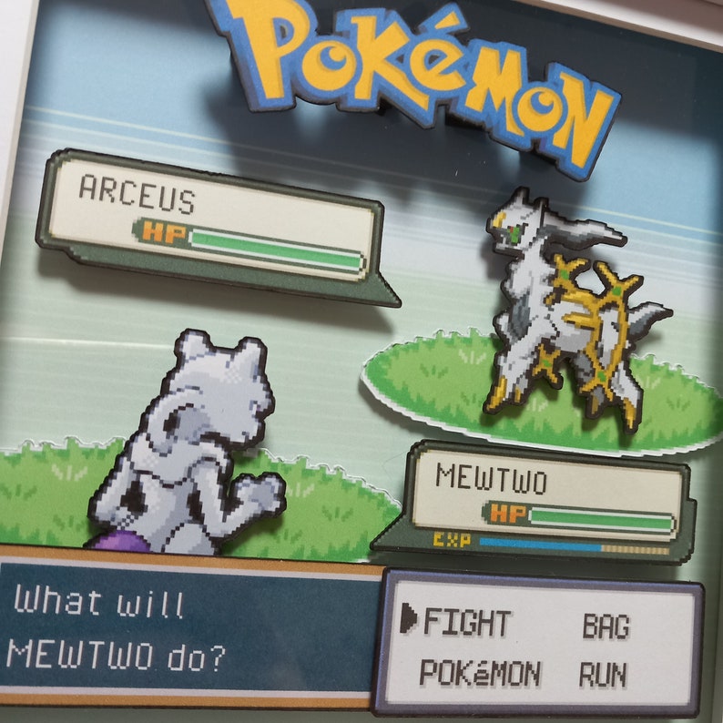 Close view of layered personalised Pokémon artwork showing raised character and battle interface details