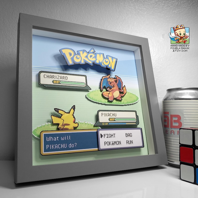 Close-up of a custom Pokémon battle shadow box showing Mewtwo facing Arceus in the FireRed and LeafGreen layout.