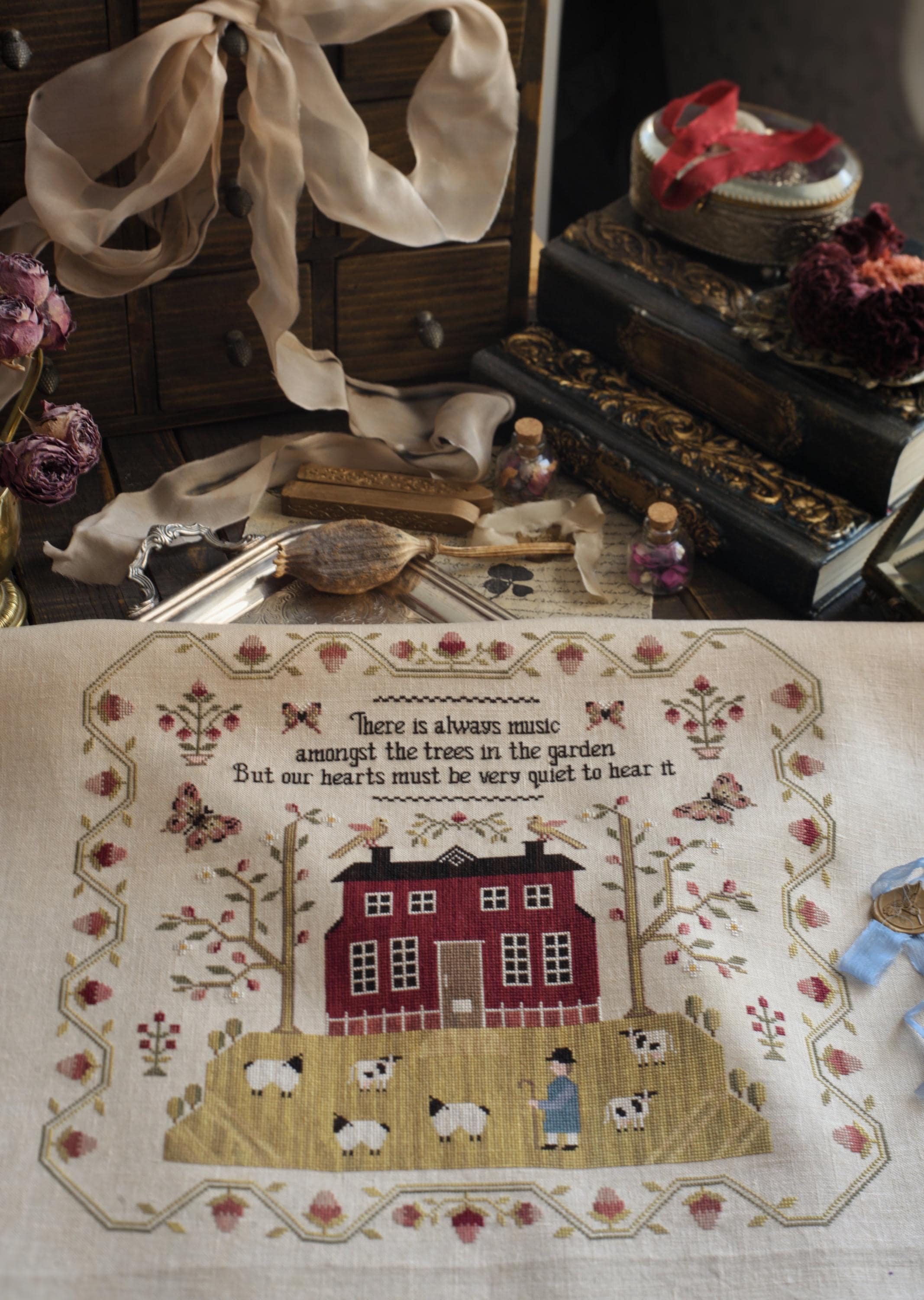 Primitive Floral Sampler Cross Stitch Pattern: Stitches Through the ...