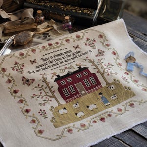 Kruissteekpatroon Garden in Bloom: primitieve bloemenmonsternemer (pdf-download) van Stitches Through the Years