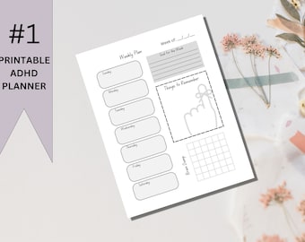May include: A printable weekly planner designed for people with ADHD. The planner includes sections for daily tasks, a brain dump area, and a section for things to remember. The planner is designed to help people with ADHD stay organized and on track.