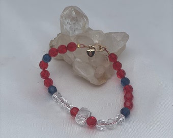 Pulsera de cuentas de cristal rojo y azul
