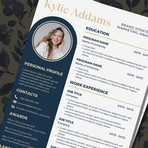 May include: A blue and gold resume template featuring a photo of a woman smiling. The resume is divided into sections for personal profile, contacts, awards, education, and work experience. The text on the resume includes the name Kylie Addams, Brand Strategist, Marketing Analyst, and the title of the document, "Resume".