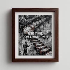 May include: Framed art print featuring a black and white illustration with a brick wall and a staircase made of clocks. A person in a hoodie is spray painting the wall. The text "USE TIME. DON'T WAIT ON IT" is displayed.