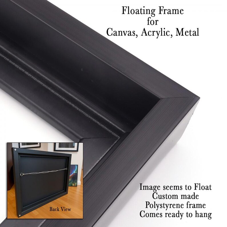 a floating frame for canvas, acrylic, and metal. The frame appears to be custom-made and ready to hang.