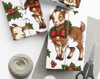 May include: White wrapping paper featuring a repeating pattern of brown goats wearing green holly wreaths with red bows and gold bells. The paper is tied with twine and includes white star and heart-shaped gift tags for decoration.