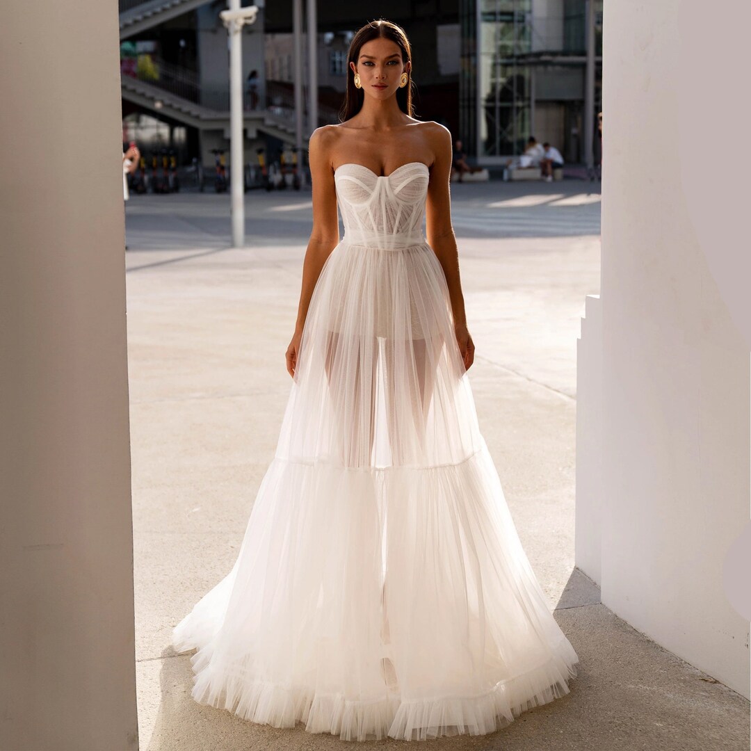 Elegant Sheer Wedding Dress Strapless Designs for Modern Brides