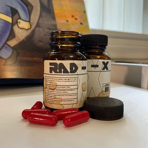 FALLOUT Rad-X Prop - 1.75x3&quot; Amber Glass Packer w/ Painted Black Cap