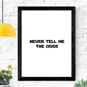 May include: Black framed poster with white background and the text "NEVER TELL ME THE ODDS" in black.