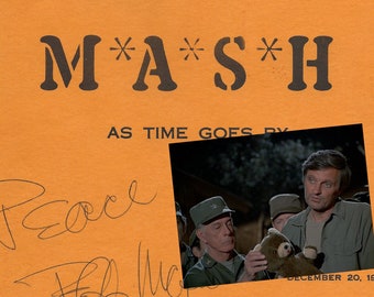 May include: A yellow script page from the TV show M*A*S*H with the episode title "As Time Goes By". The page has a photo of actors from the show, a signature, and the date December 20, 1982.