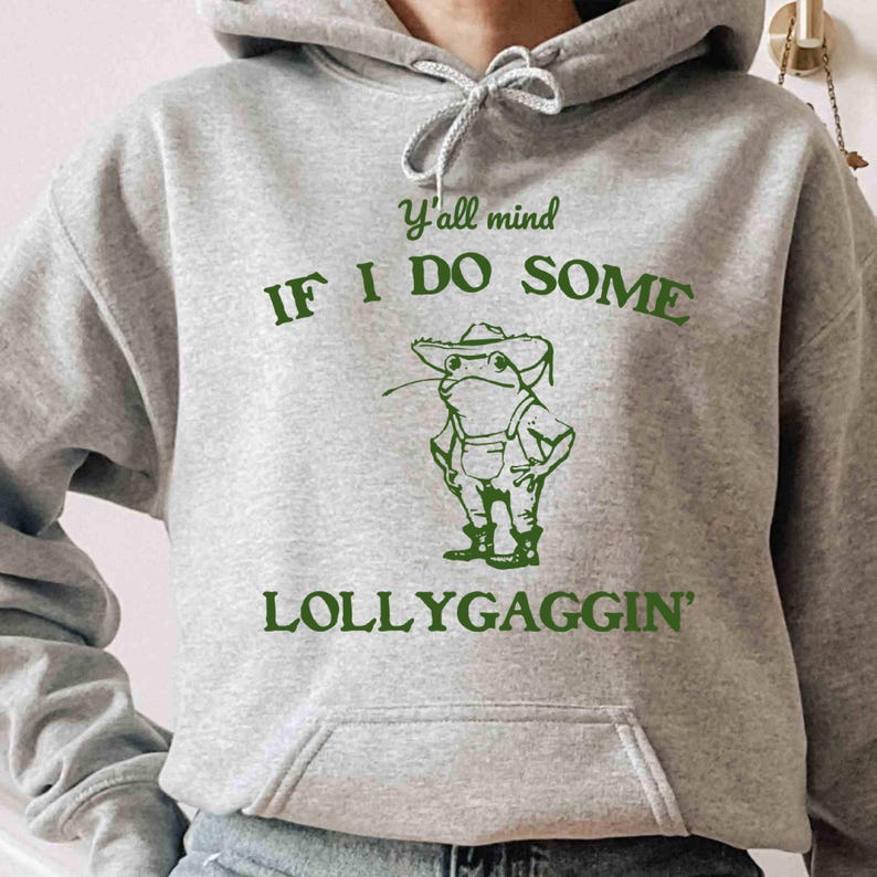 May include: A gray hoodie with a green frog graphic and the text "Y'all mind if I do some lollygaggin'" printed on the front.