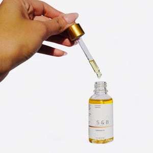 Natural face and body oil made with calendula jojoba and sweet almond oil
