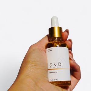 Handcrafted small batch calendula oil by S&B Botanicals