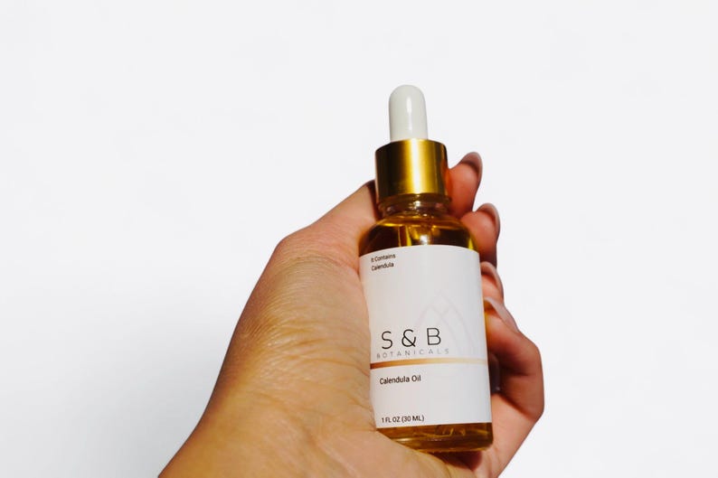 Handcrafted small batch calendula oil by S&B Botanicals