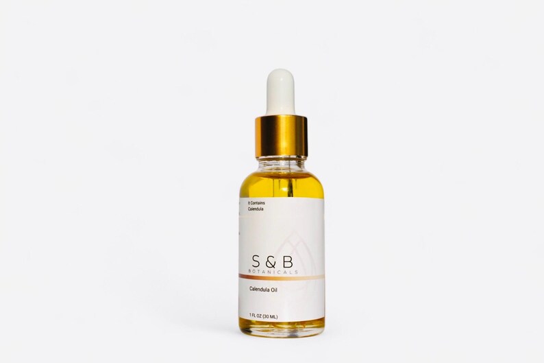 Calendula face and body oil in glass dropper bottle for natural skincare