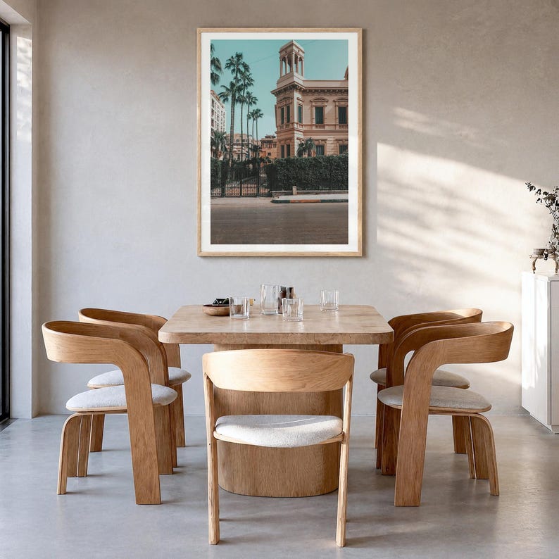 Alexandria Fine Art Photo Print, al-iskandariyah poster, white border in a natural wood frame, hanging in a dining room