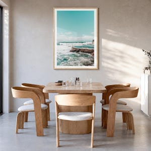 Bronte Beach Ocean Pool Fine Art Photo Print, sydney poster, white border in a natural wood frame, hanging in a dining room