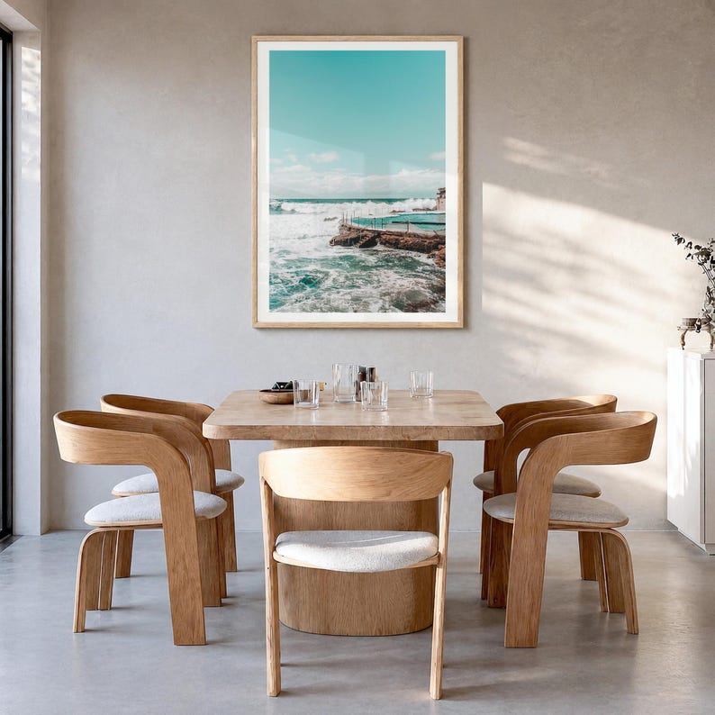 Bronte Beach Ocean Pool Fine Art Photo Print, sydney poster, white border in a natural wood frame, hanging in a dining room