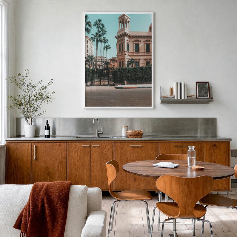 Alexandria Fine Art Photo Print, al-iskandariyah poster, full image (no border) in a white wood frame, hanging in a kitchen with a dining area