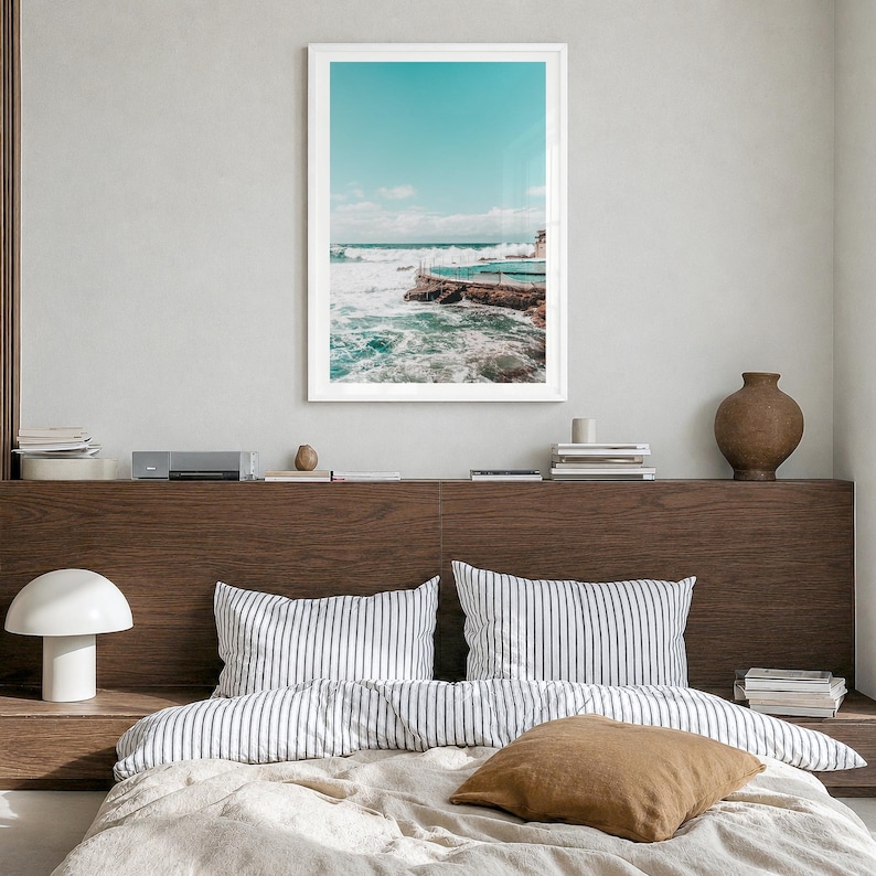 Bronte Beach Ocean Pool Fine Art Photo Print, sydney poster, white border in a white wood frame, hanging in a bedroom