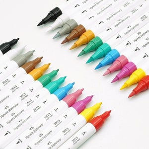 12 rotuladores acrílicos de doble punta, punta de pincel y punta redonda, colores surtidos, incluida pintura blanca.