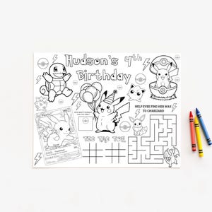 May include: A white rectangular activity sheet featuring black line art of various characters, a trading card, a maze, and tic-tac-toe grids. The text reads Hudson's 4th Birthday, Help Evee find her way to Charizard, and Tic Tac Toe. Three crayons are included.