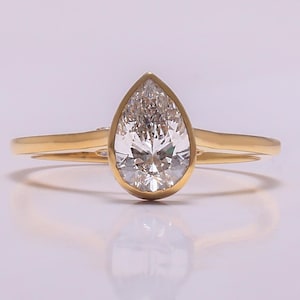 Pear Cut Lab Grown Diamond Engagement Ring: 14K Gold Hidden Halo Solitaire