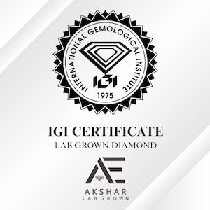 May include: A certificate featuring the text "IGI CERTIFICATE LAB GROWN DIAMOND" and the International Gemological Institute logo. The logo is a black and white circular design with the text "INTERNATIONAL GEMOLOGICAL INSTITUTE" and a diamond shape.
