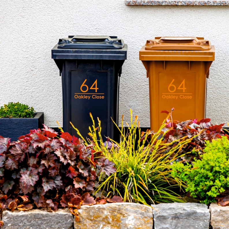 Custom, orange bin decals with your personalised house number and address. These bin stickers are handmade using waterproof vinyl. Sold in a variety of sizes in sets of 2, 3 or 4.